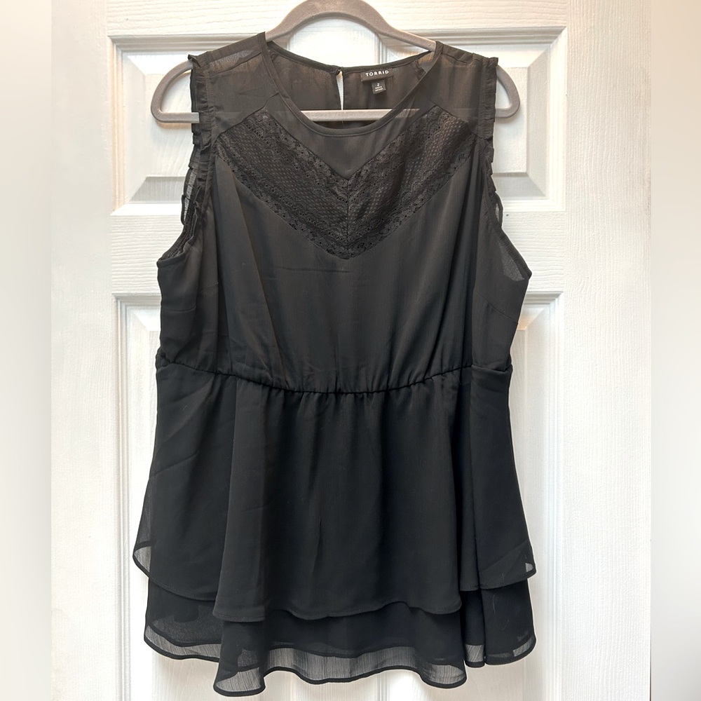 Sleeveless peplum top